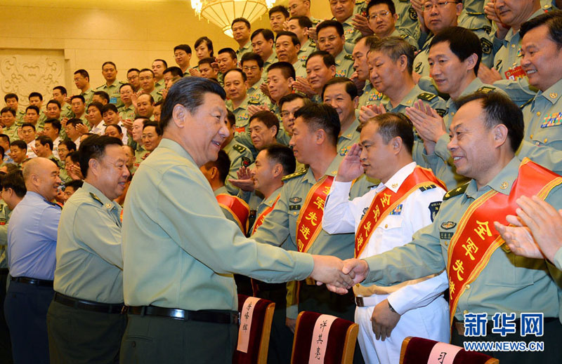 2014年9月22日，习近平在北京接见全军参谋长会议代表。李刚摄