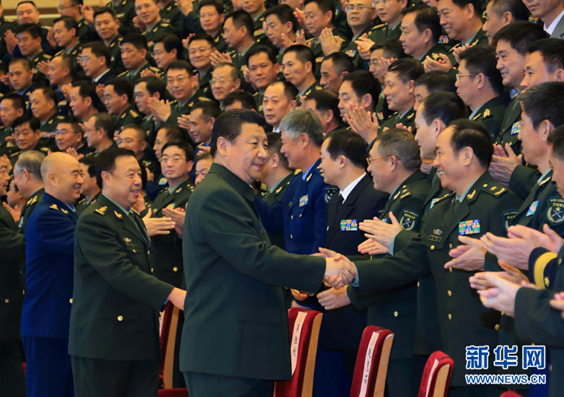 2015年1月29日，习近平在北京接见全军外事工作会议和第十六次武官工作会议代表。 李刚摄